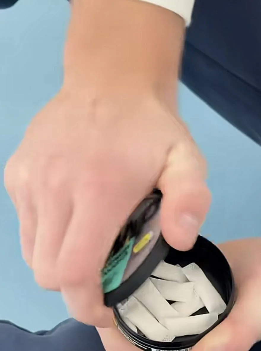 Jake opening a WIP energy pouch tin